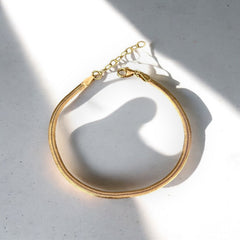 Effortless Elegance — Gold Herringbone Bracelet