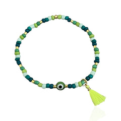 I carry balance and healing energy — Green Evil Eye Beaded Bracelet